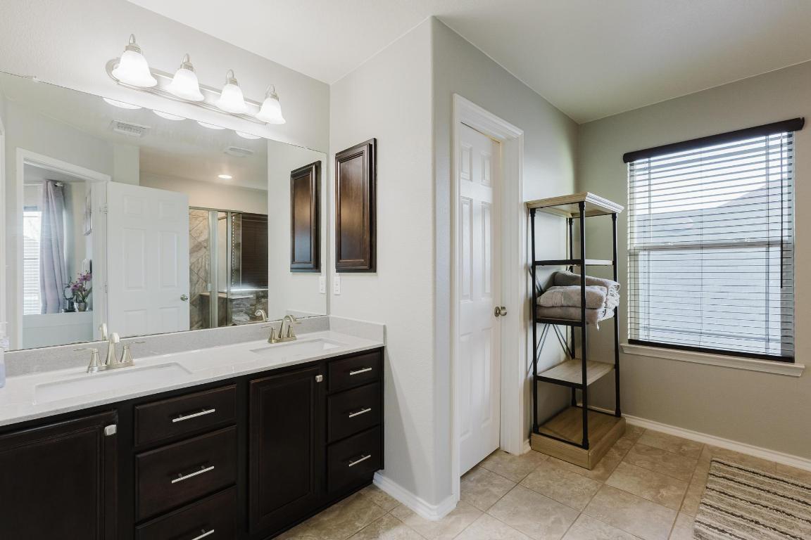 1420 Crested Butte Way Georgetown, TX 78626 - Photo 25 of 40 Primary bathroom with double vanity