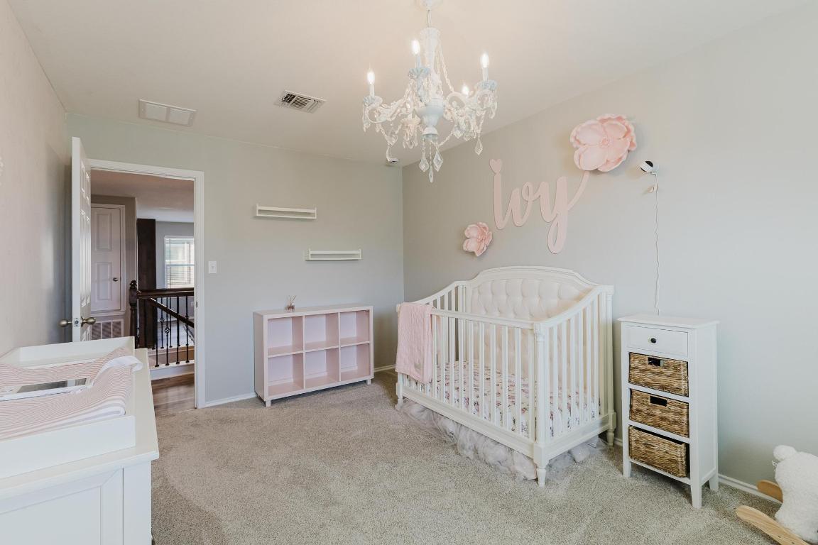 1420 Crested Butte Way Georgetown, TX 78626 - Photo 27 of 40 Bedroom 1 (chandelier does not convey)