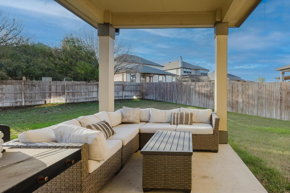 1420 Crested Butte Way Georgetown, TX 78626 - Photo 33 of 40 Fenced backyard featuring a patio area and an outdoor living space