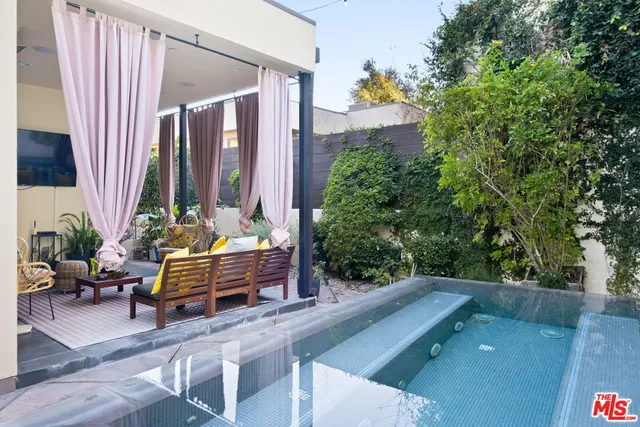 a view of balcony with furniture