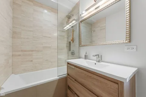 a bathroom with a sink and a bathtub