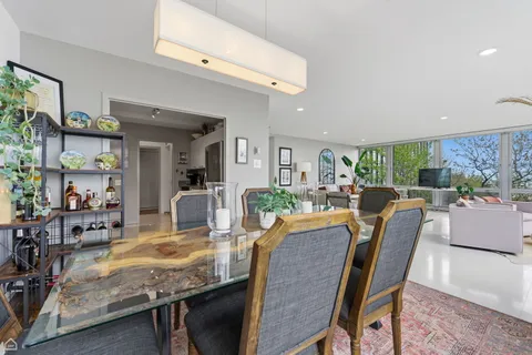 a view of a dining room with furniture