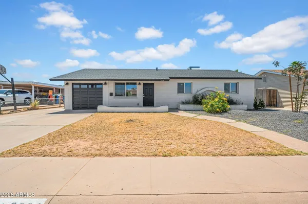a front view of house with yard
