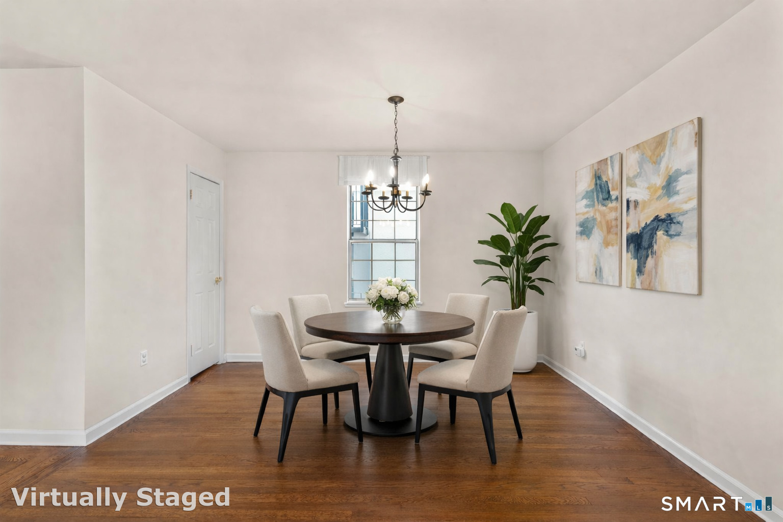 254 Seaside Avenue, Unit A Stamford, CT 06902 - Photo 14 of 28 a dining room with furniture and wooden floor