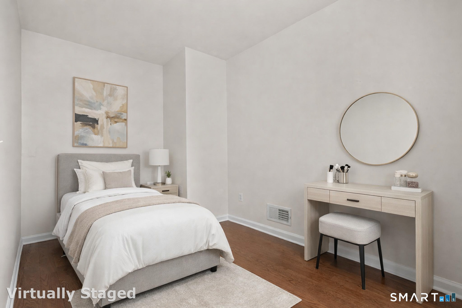 254 Seaside Avenue, Unit A Stamford, CT 06902 - Photo 18 of 28 a bedroom with a bed and a chandelier