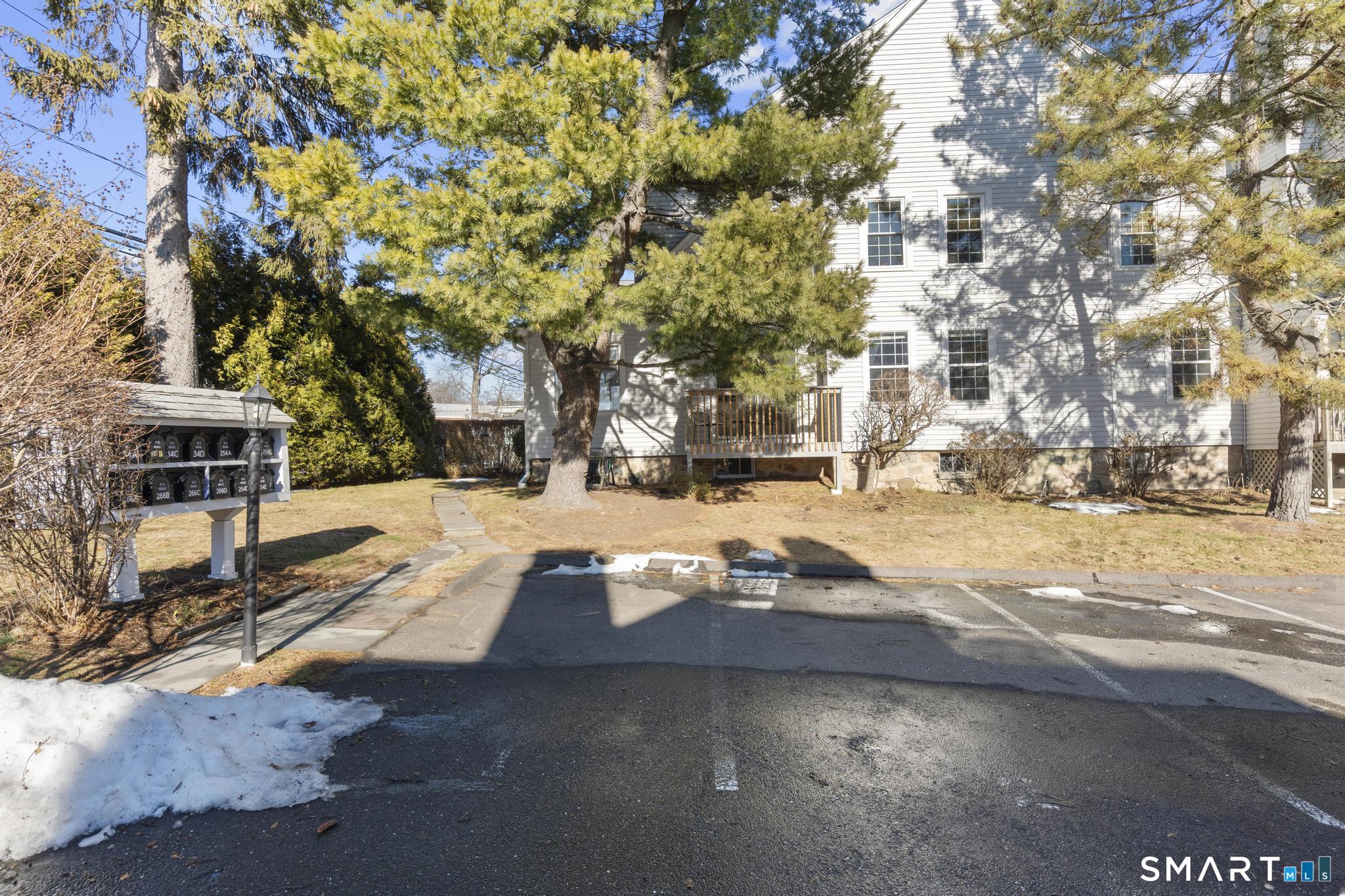 254 Seaside Avenue, Unit A Stamford, CT 06902 - Photo 26 of 28 a view of road with yard