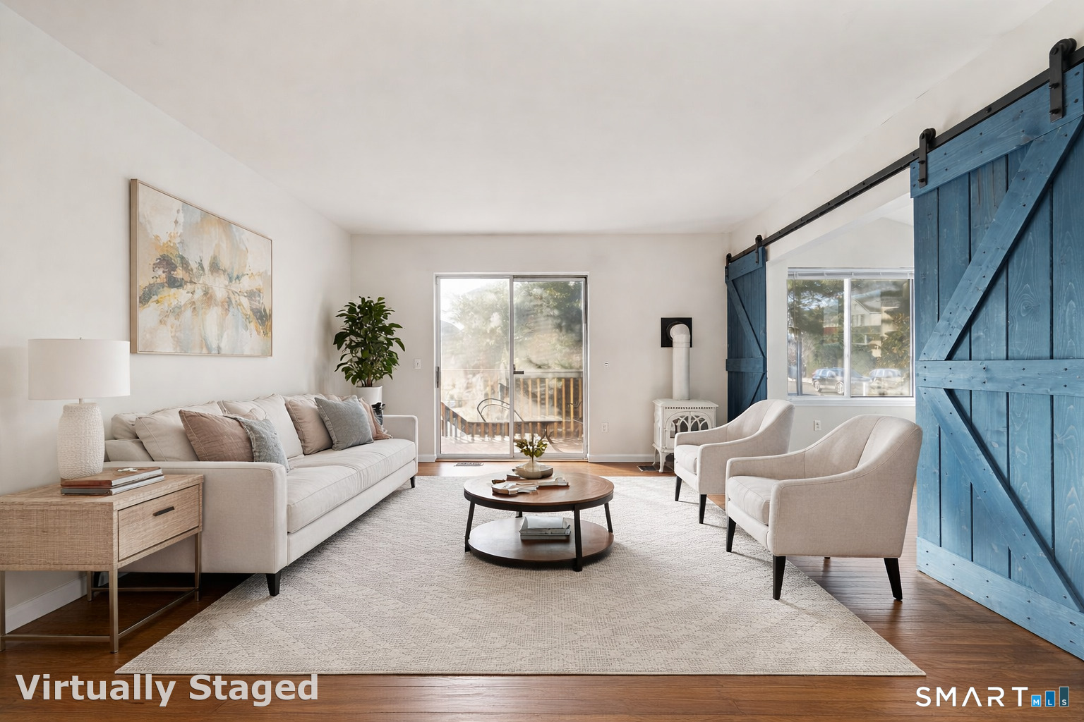 254 Seaside Avenue, Unit A Stamford, CT 06902 - Photo 5 of 28 a living room with furniture and a large window