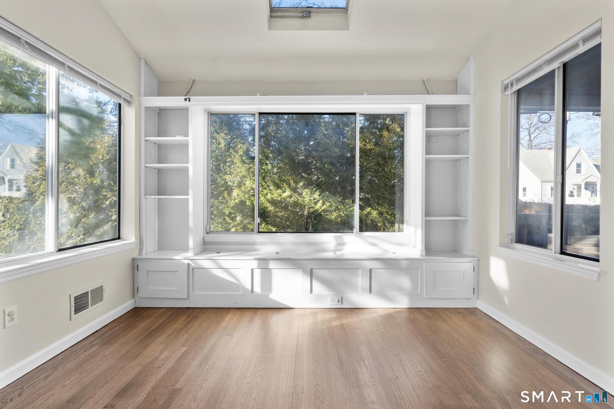 254 Seaside Avenue, Unit A Stamford, CT 06902 - Photo 10 of 28 a view of a room with a large window
