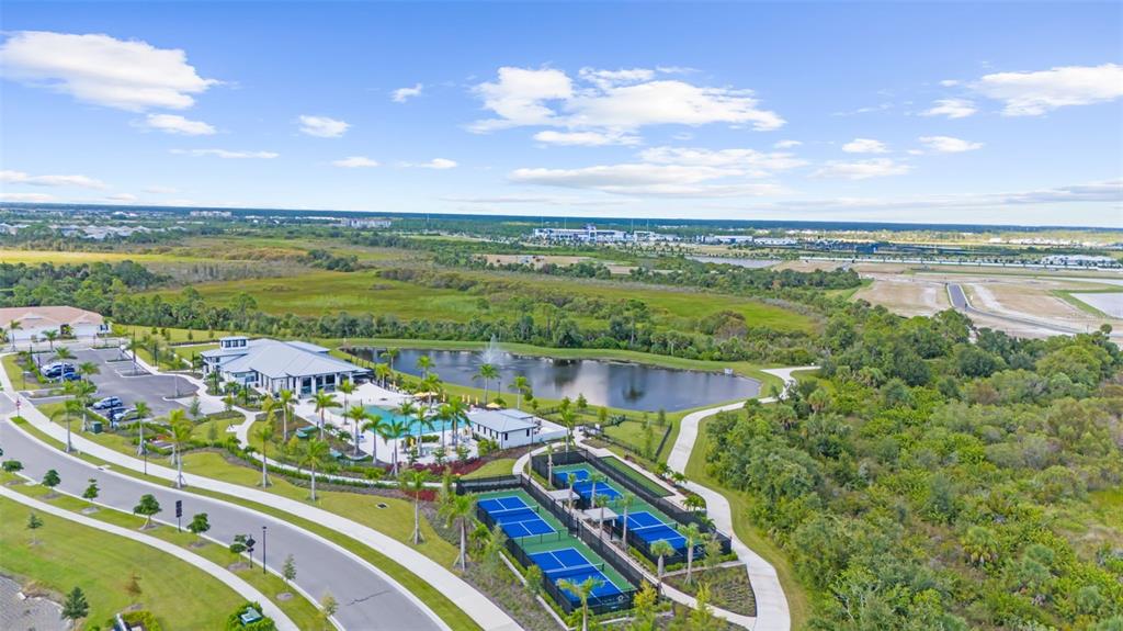 12333 Asana Court Venice, FL 34293 - Photo 58 of 58 a view of a lake with a city