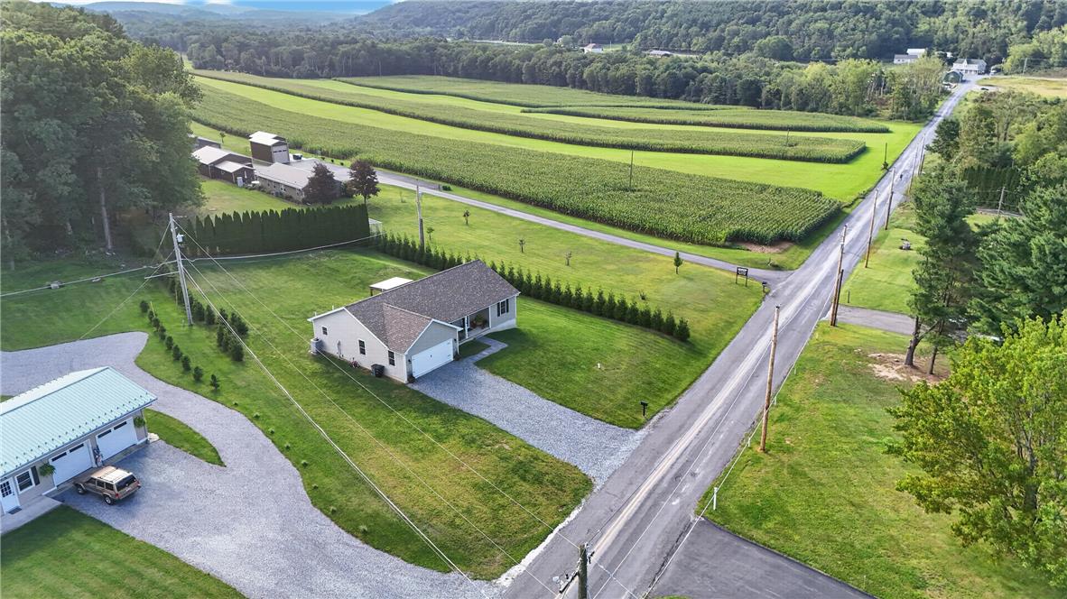 74 Kepners Road New Ringgold, PA 17960 - Photo 72 of 79 An aerial view showcases this country home surrounded by sprawling fields and rolling hills.