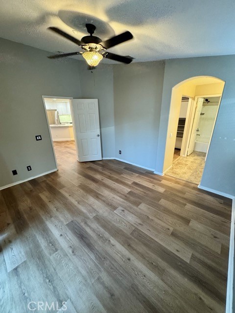 41685 Woodridge Avenue, Unit 2 Murrieta, CA 92562 - Photo 13 of 22 a view of a room with wooden floor