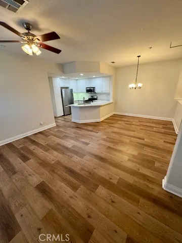 a view of a kitchen with a sink