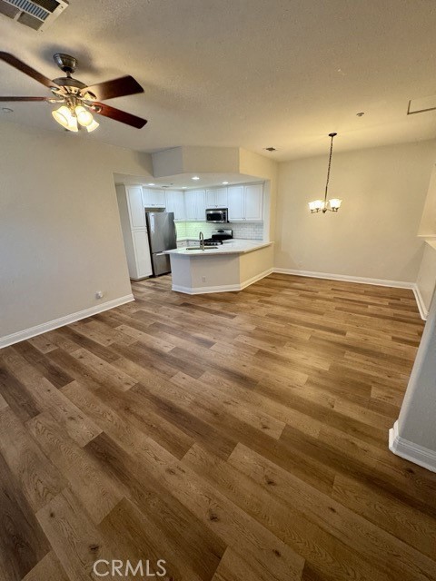 41685 Woodridge Avenue, Unit 2 Murrieta, CA 92562 - Photo 3 of 22 a view of a kitchen with a sink