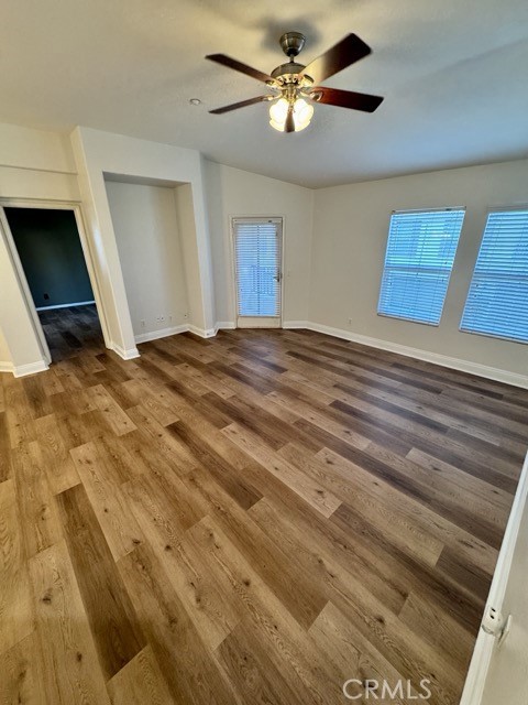 41685 Woodridge Avenue, Unit 2 Murrieta, CA 92562 - Photo 5 of 22 a view of an empty room with a window