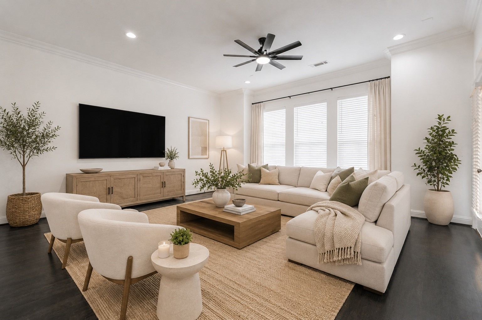 19 Versante Court Houston, TX 77070 - Photo 14 of 40 This beautifully designed living space combines warm neutral tones, expansive natural light, and a sleek entertainment wall to create the perfect blend of comfort and modern elegance. Virtually Staged