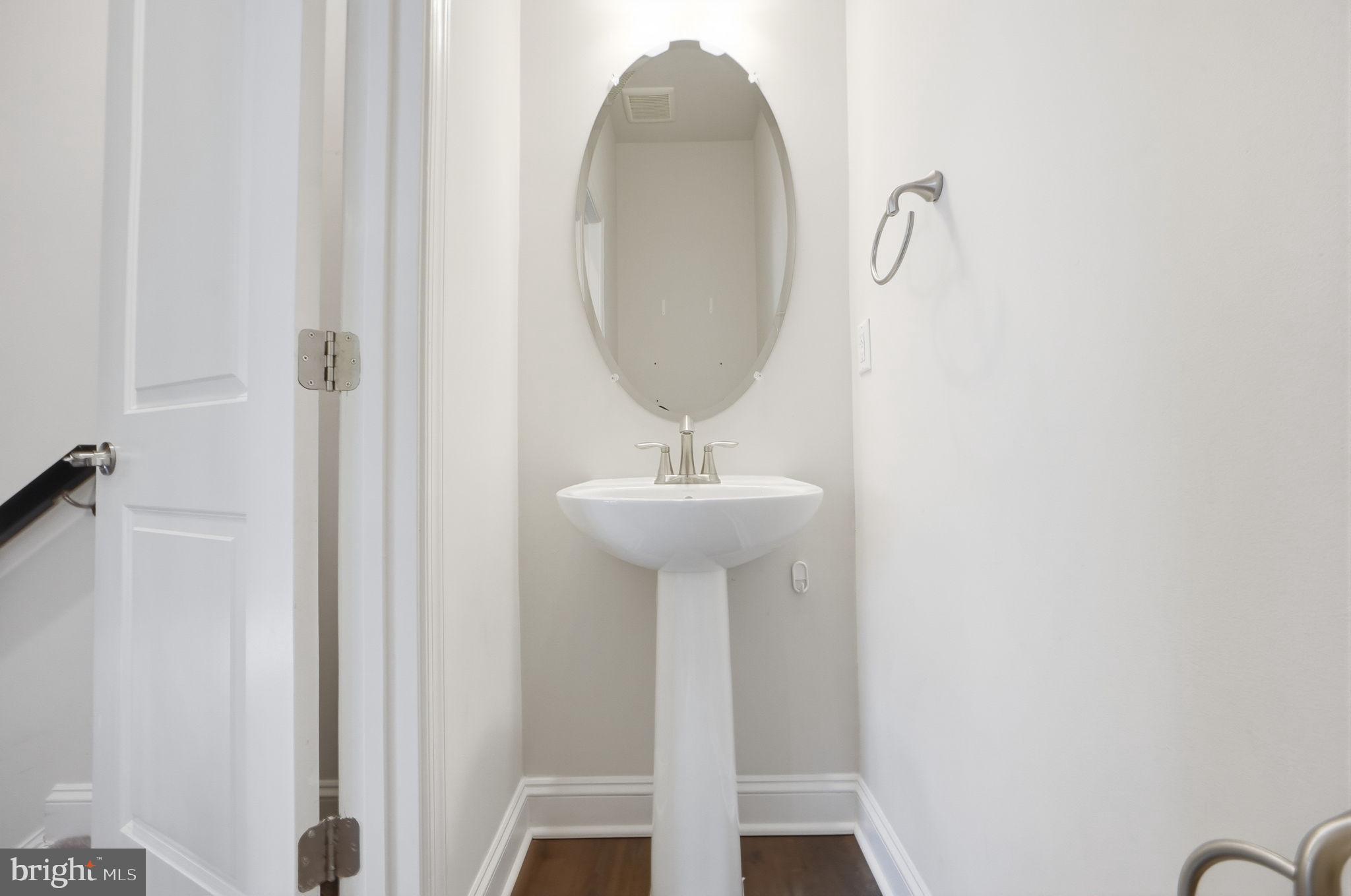 3623 Duckhorn Way Laurel, MD 20724 - Photo 11 of 48 a bathroom with a sink and a mirror