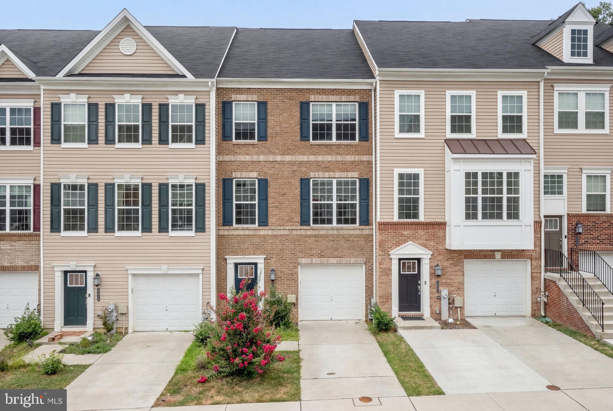 3623 Duckhorn Way Laurel, MD 20724 - Photo 2 of 48 a front view of a house with a garden