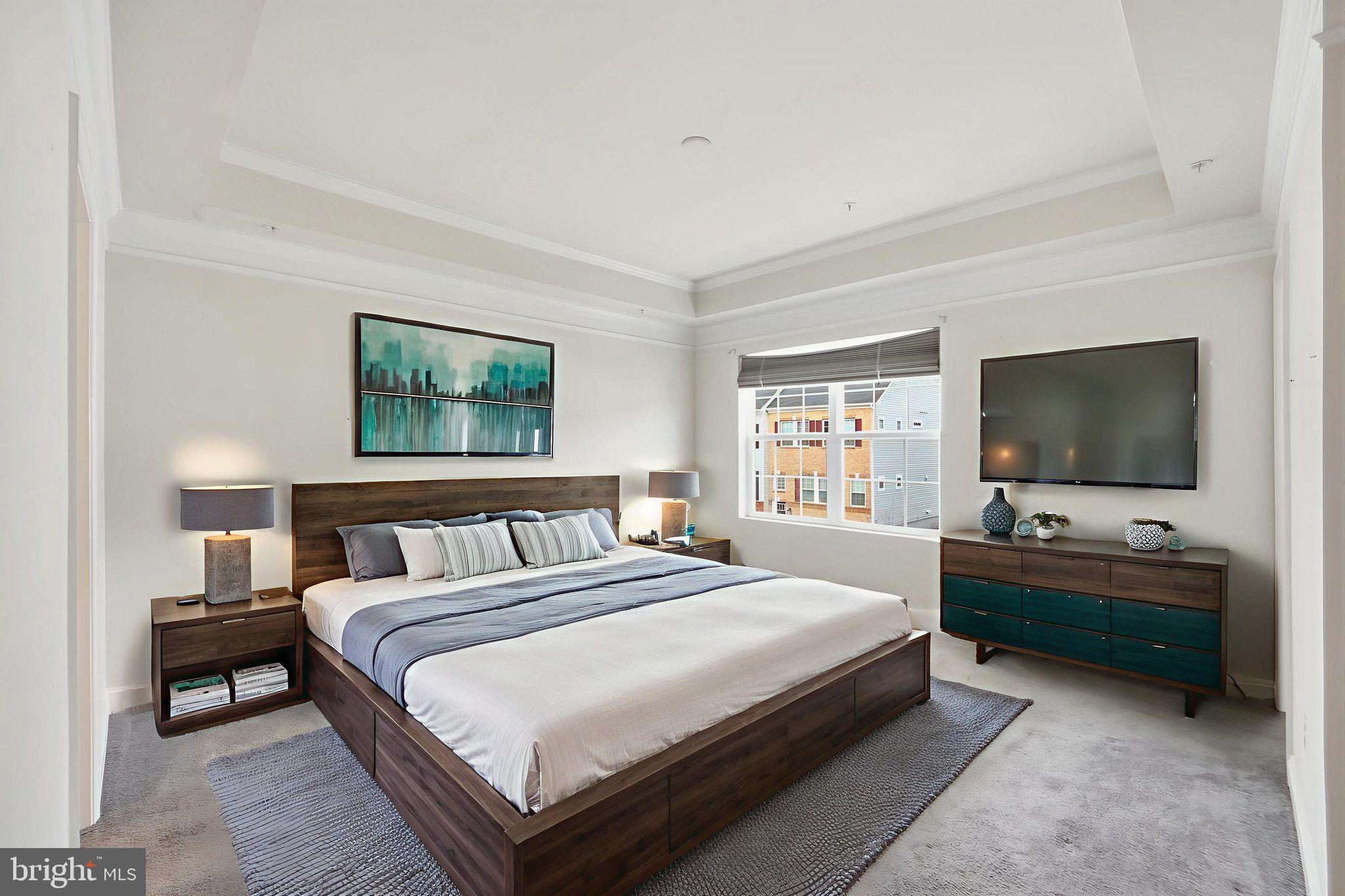 3623 Duckhorn Way Laurel, MD 20724 - Photo 25 of 48 a bedroom with a bed and a flat screen tv