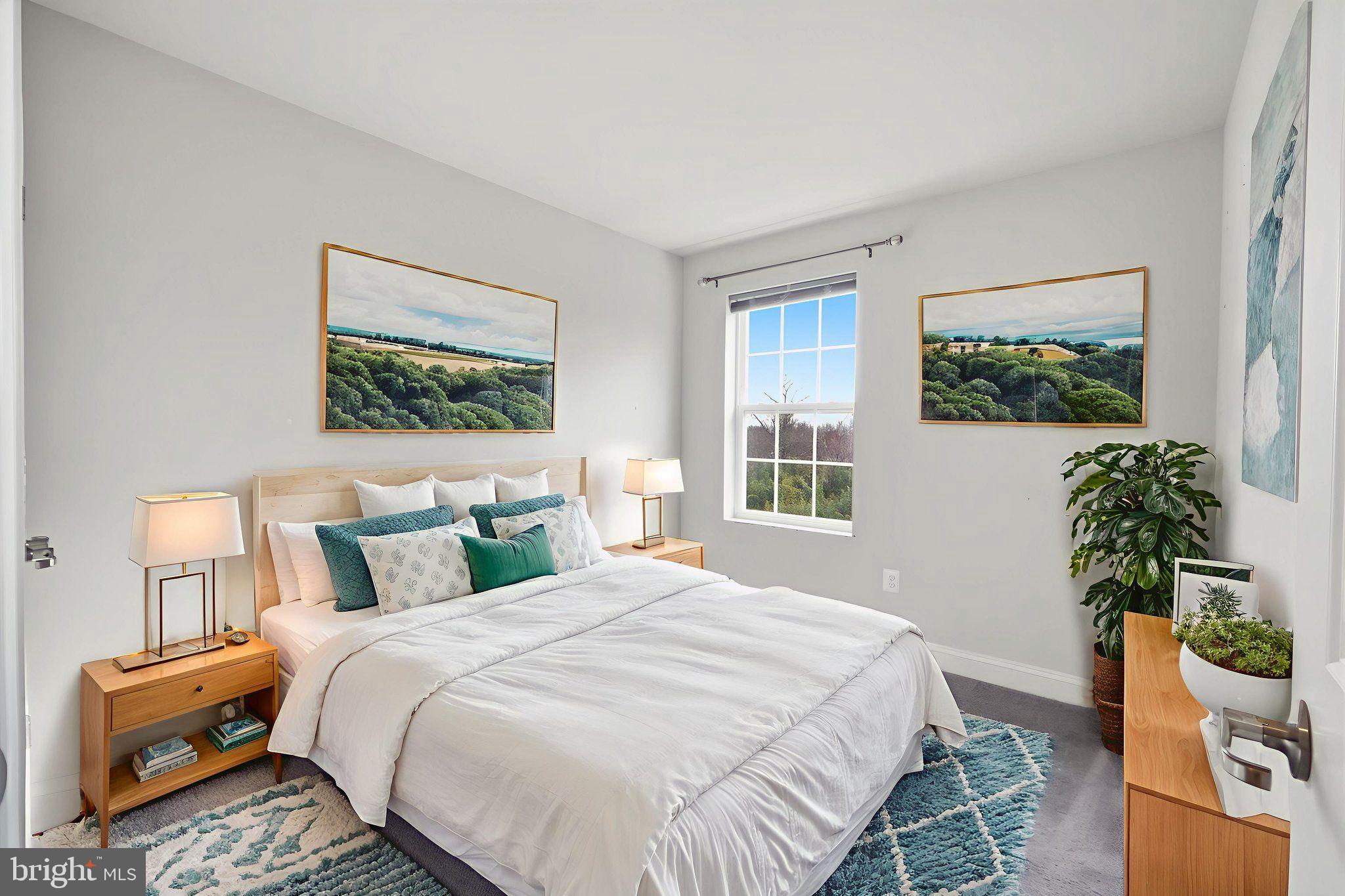 3623 Duckhorn Way Laurel, MD 20724 - Photo 35 of 48 a bedroom with a bed and a potted plant