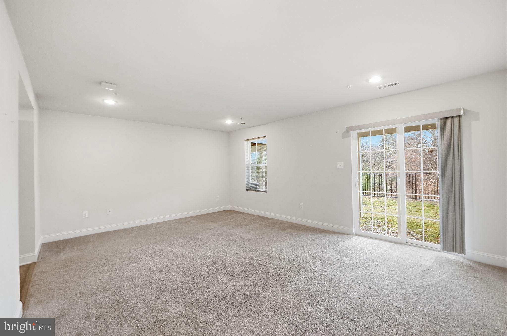 3623 Duckhorn Way Laurel, MD 20724 - Photo 8 of 48 an empty room with windows