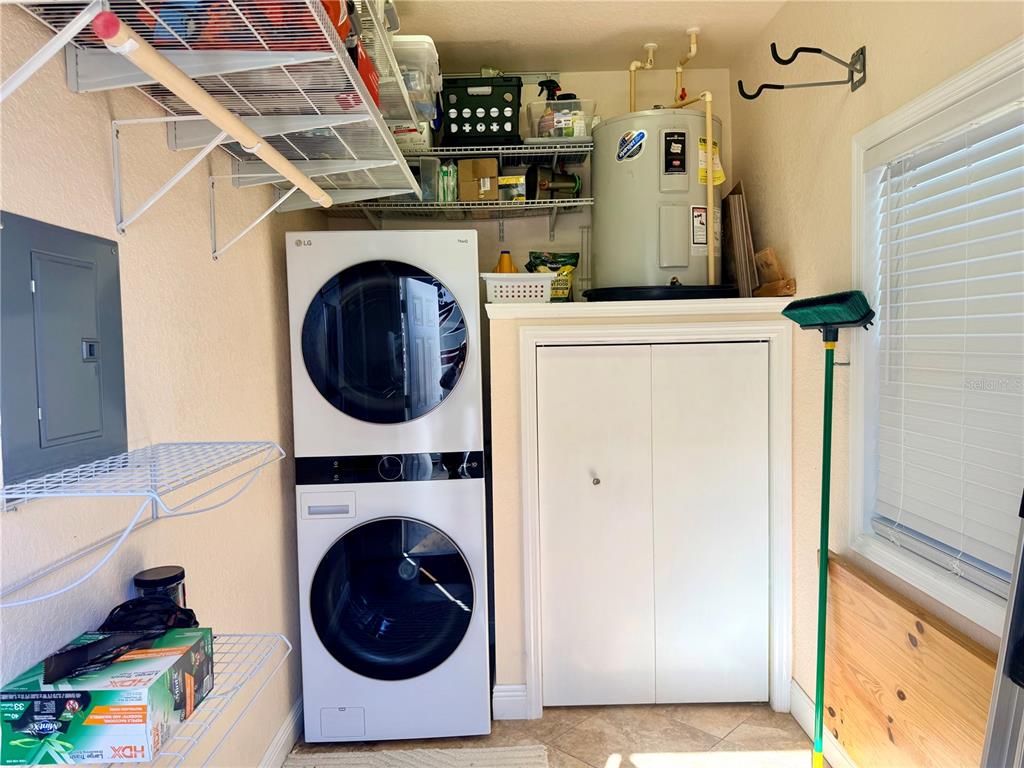 9516 Southeast 47th Way Webster, FL 33597 - Photo 28 of 43 a utility room with dryer and washer