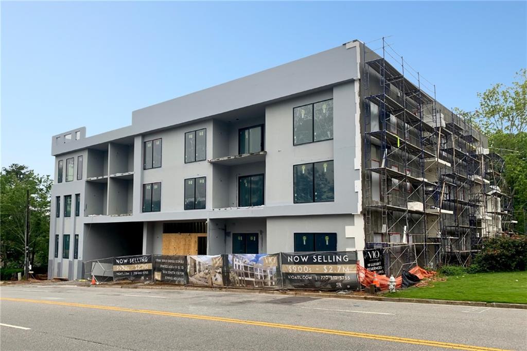 318 Sandy Springs Circle, Unit 270 Sandy Springs, GA 30328 - Photo 12 of 29 a view of a building with a street