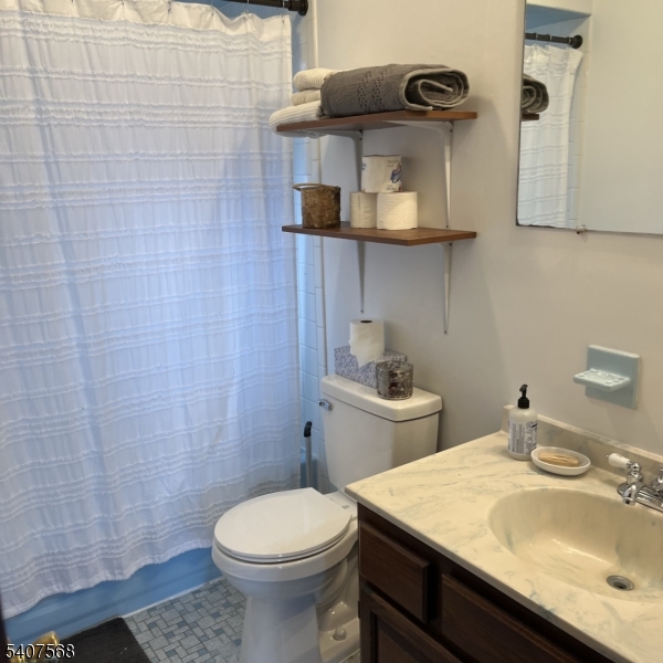 6 Jans Way Andover, NJ 07821 - Photo 18 of 23 a bathroom with a sink and a toilet