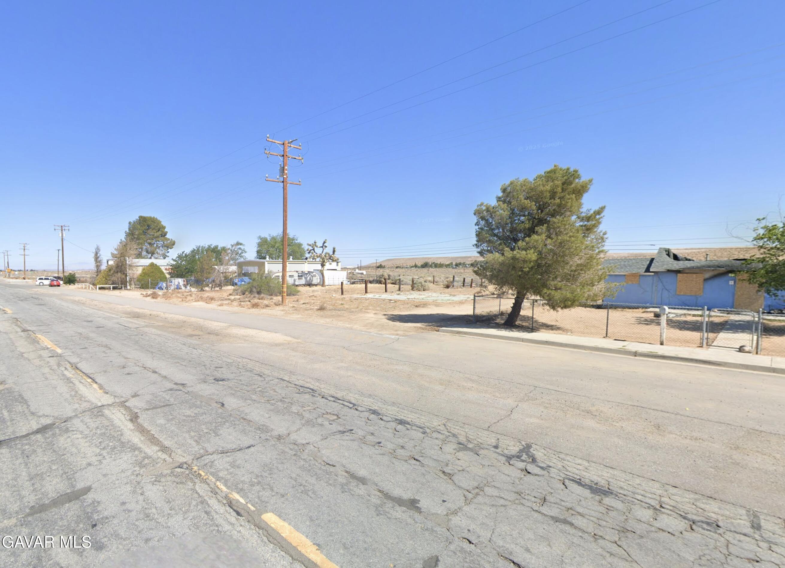26081 Twenty Mule Team Road Boron, CA 93516 - Photo 2 of 3 a view of a road with a building in the background