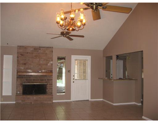 4609 Weiskopf Circle Corpus Christi, TX 78413 - Photo 3 of 6 a view of a livingroom with a chandelier
