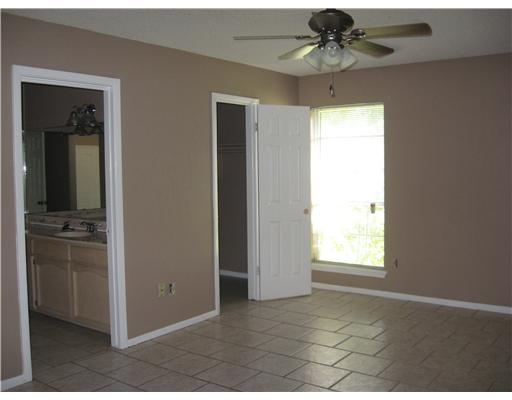 4609 Weiskopf Circle Corpus Christi, TX 78413 - Photo 5 of 6 a view of an empty room with a window