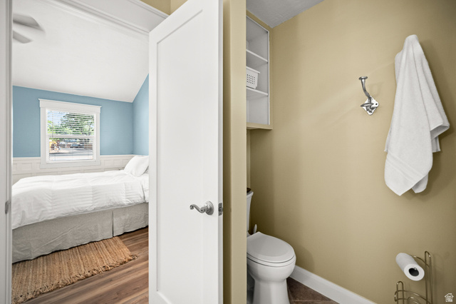 236 West 300 South Hurricane, UT 84737 - Photo 41 of 76 White paneled door opening to a space with light blue walls and white wainscoting