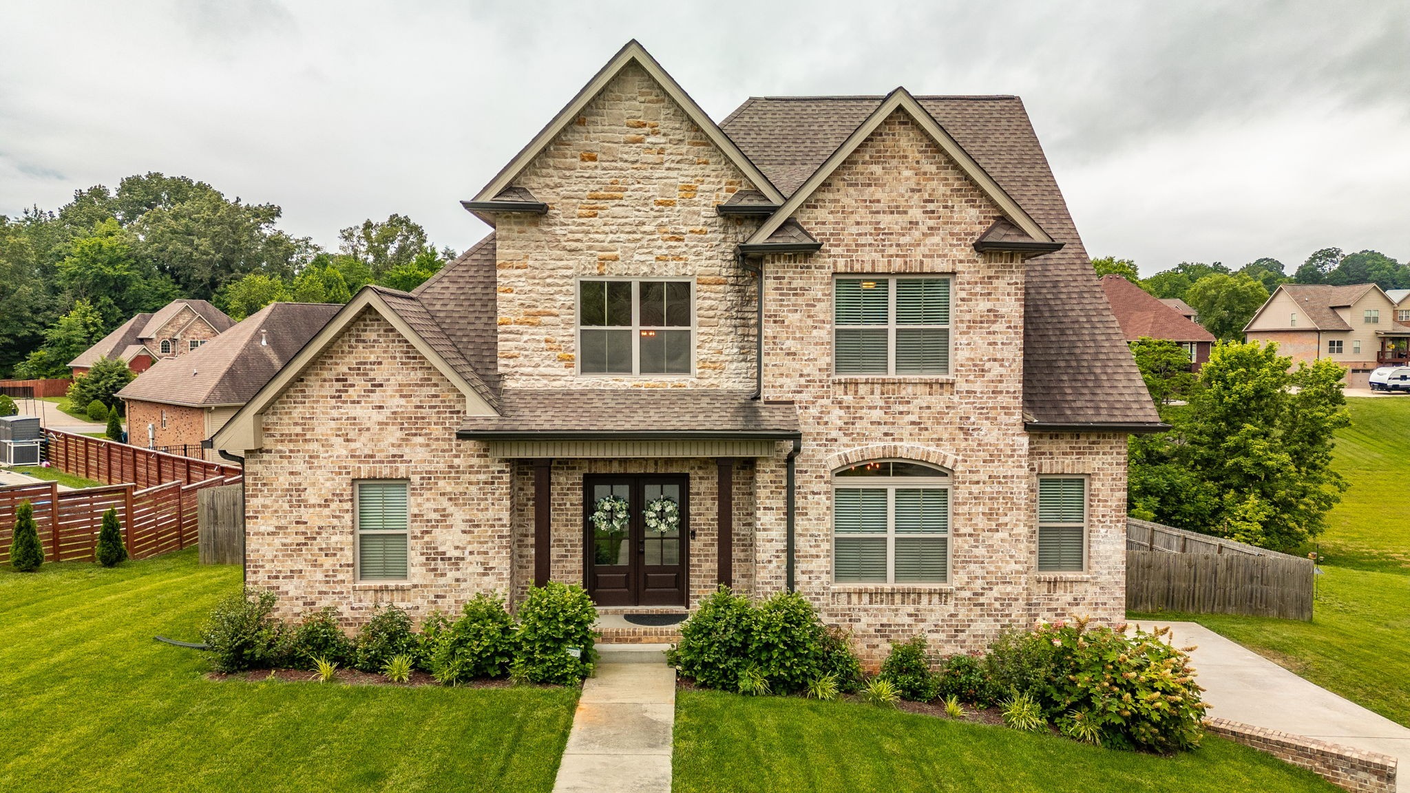 front view of a house with a yard