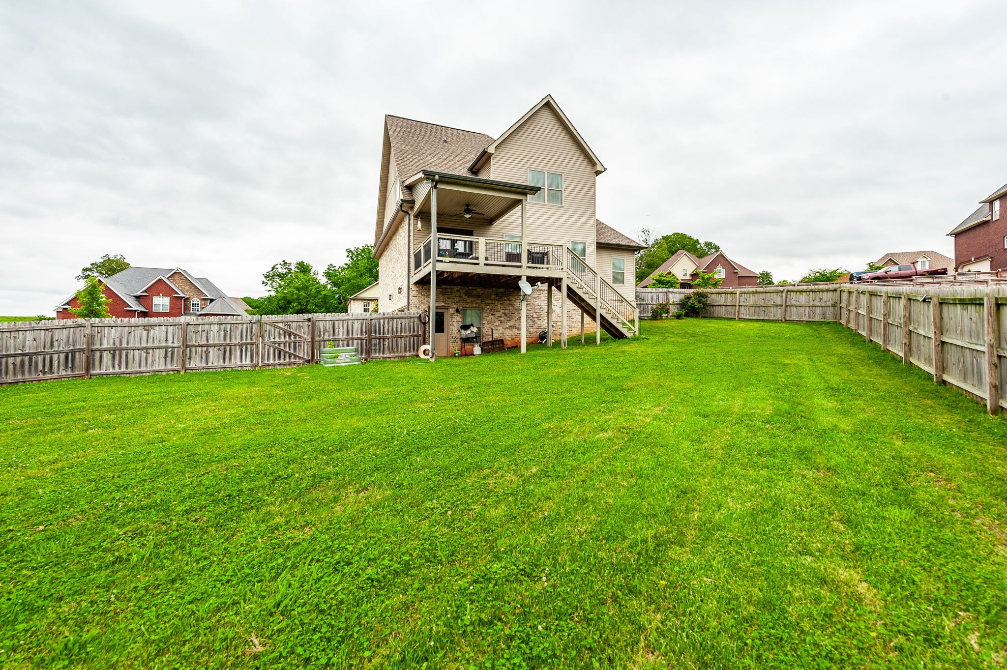 1184 Wicke Road Adams, TN 37010 - Photo 26 of 41 a view of a house with backyard and porch