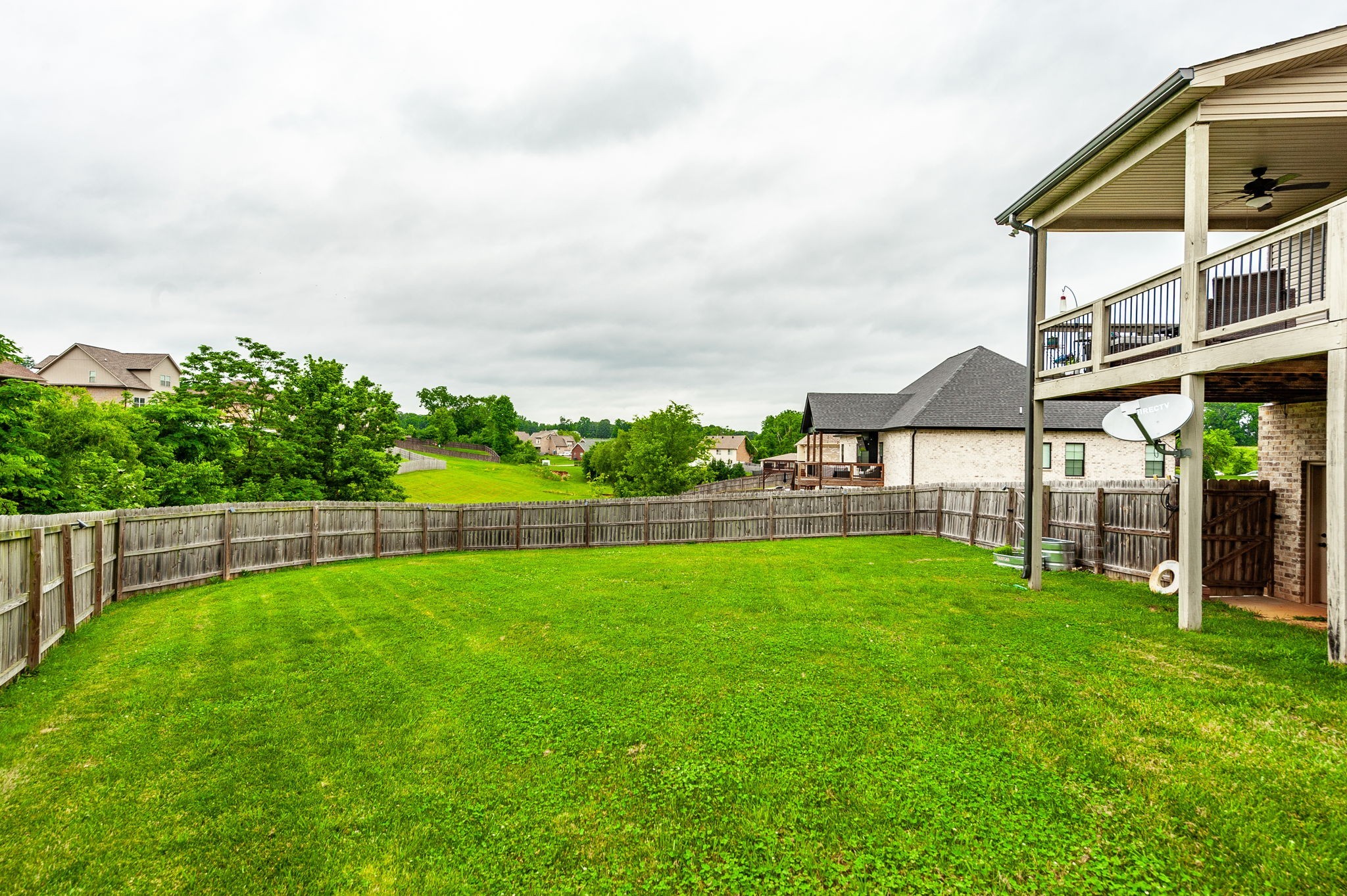 1184 Wicke Road Adams, TN 37010 - Photo 27 of 41 a view of a house with a yard and sitting area