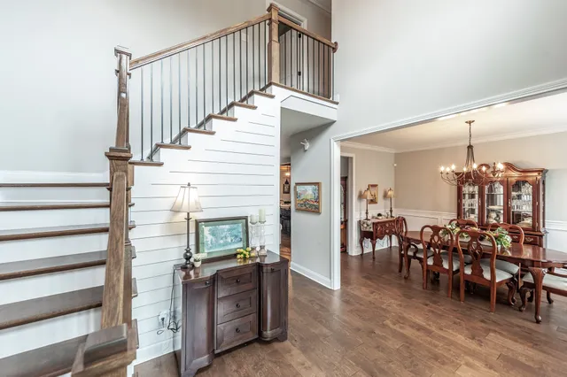 a view of living room kitchen and dining room