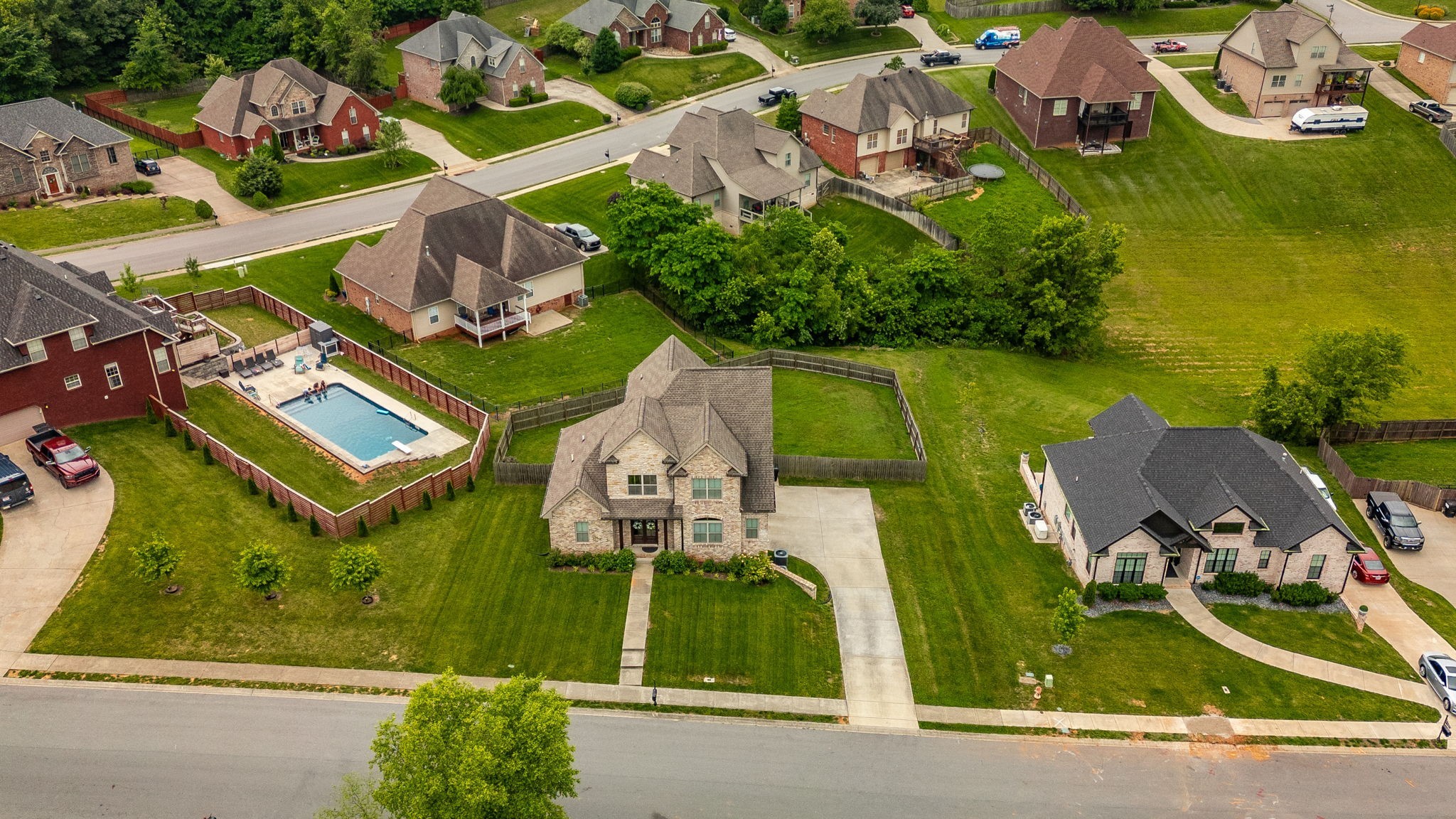 1184 Wicke Road Adams, TN 37010 - Photo 40 of 41 an aerial view of a house with a garden and pool