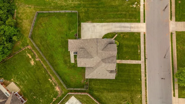 swimming pool with a yard