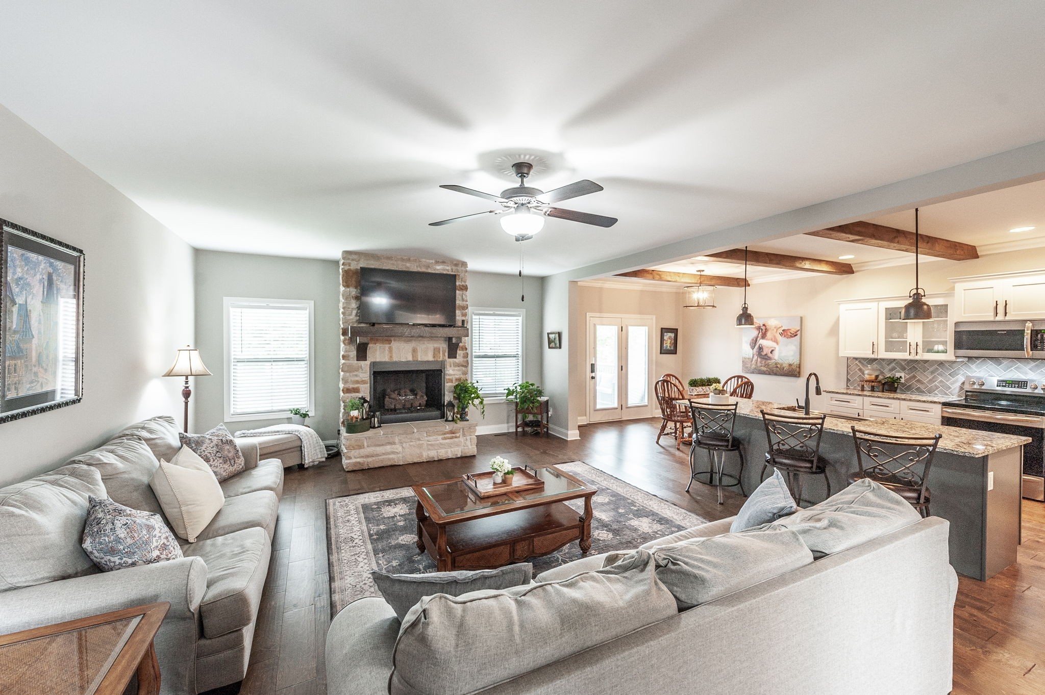 1184 Wicke Road Adams, TN 37010 - Photo 5 of 41 a living room with furniture kitchen view and a large window