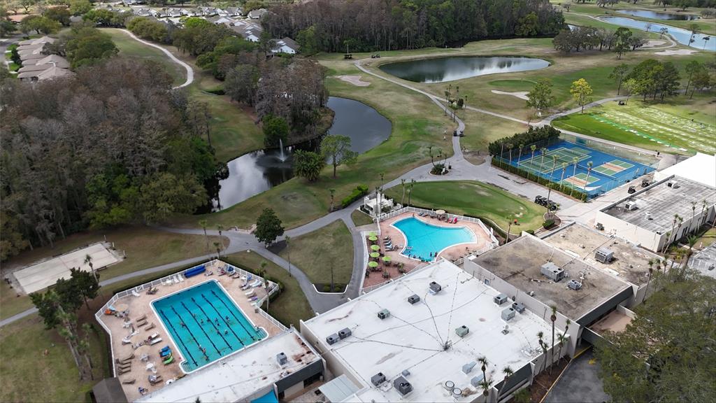 3637 Downfield Place, Unit 402 New Port Richey, FL 34655 - Photo 25 of 39 an aerial view of a house having swimming pool