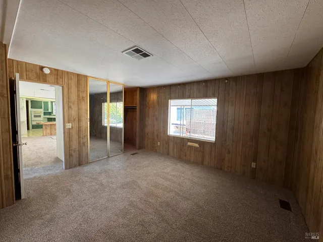 a view of empty room with windows