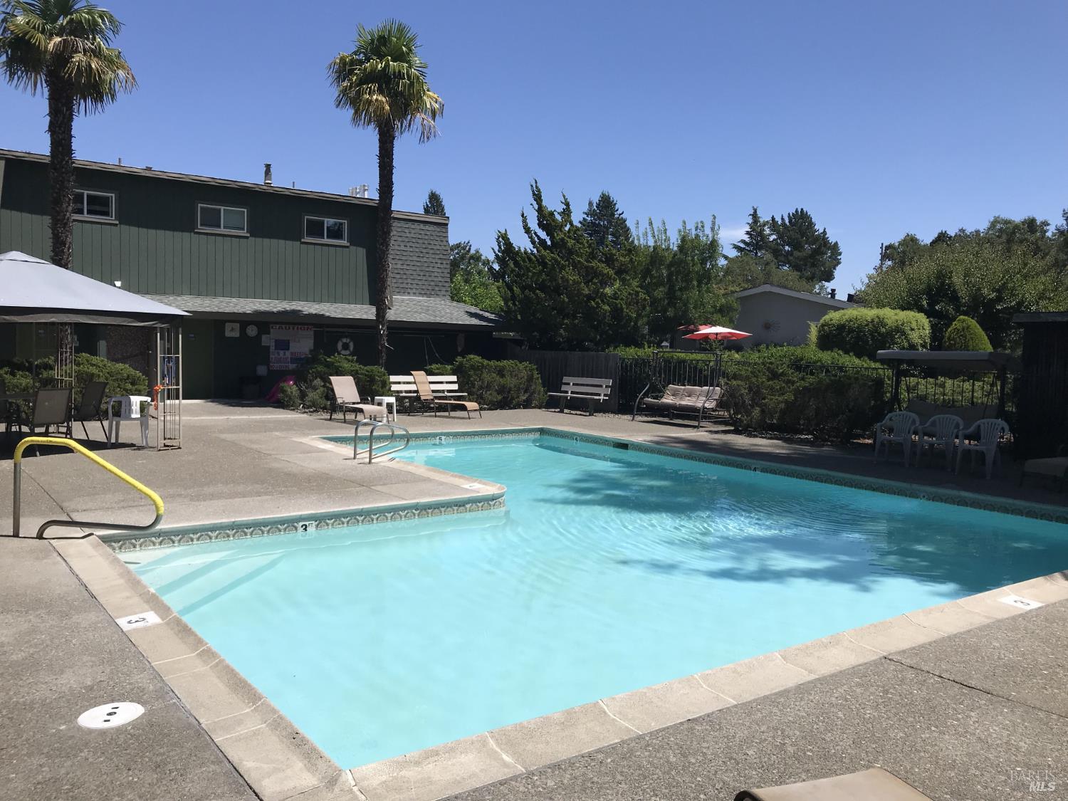 91 Greenrock Court Santa Rosa, CA 95409 - Photo 26 of 31 a swimming pool with outdoor seating and yard