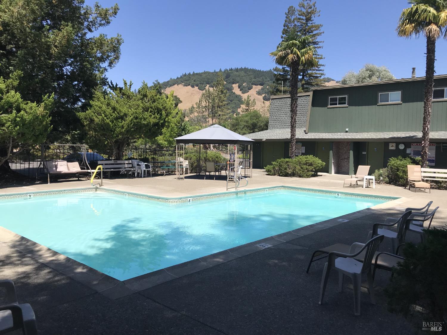 91 Greenrock Court Santa Rosa, CA 95409 - Photo 27 of 31 a swimming pool with outdoor seating and yard