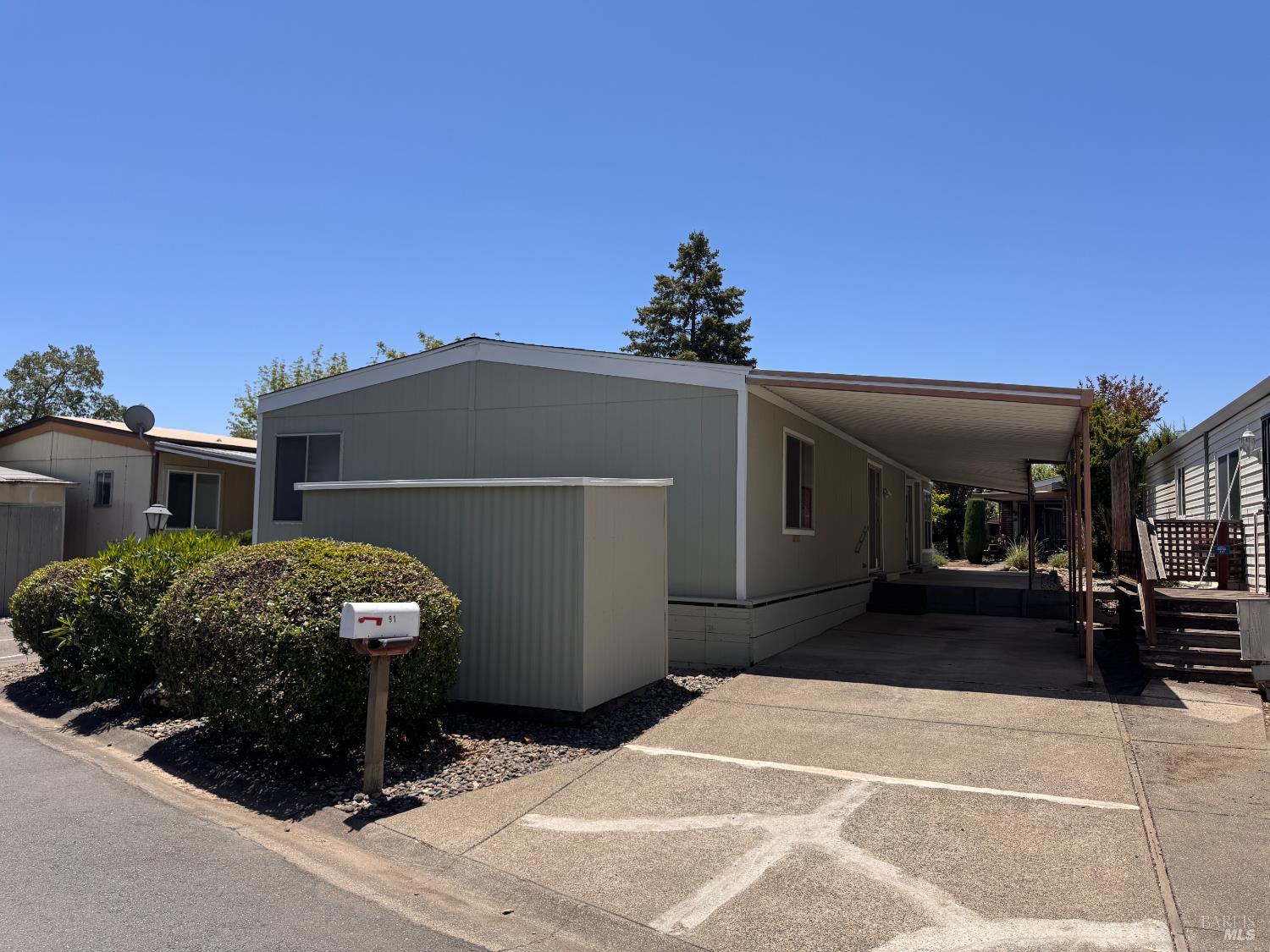 91 Greenrock Court Santa Rosa, CA 95409 - Photo 3 of 31 a front view of a house with a garage