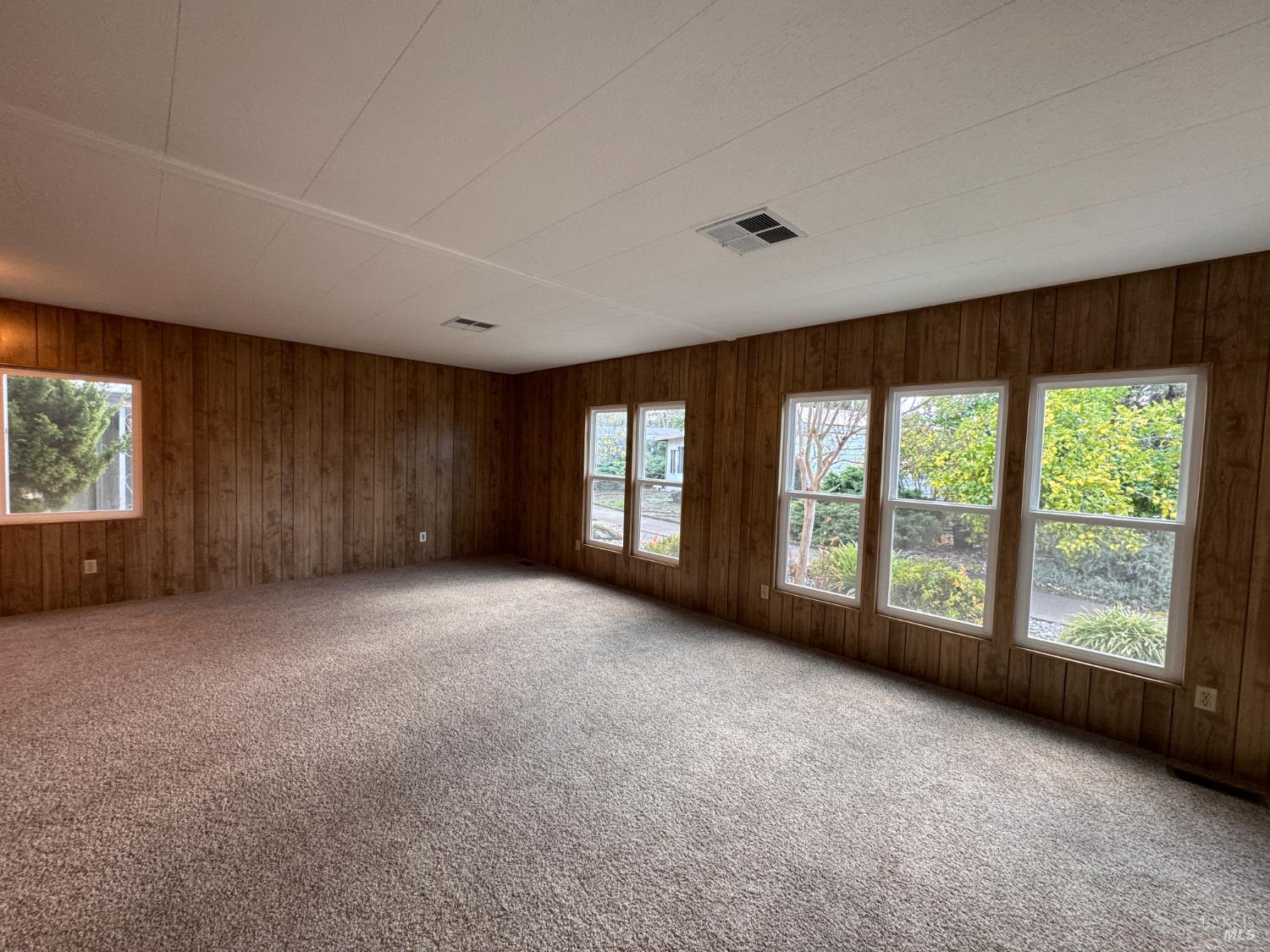 91 Greenrock Court Santa Rosa, CA 95409 - Photo 7 of 31 a view of an empty room with a window