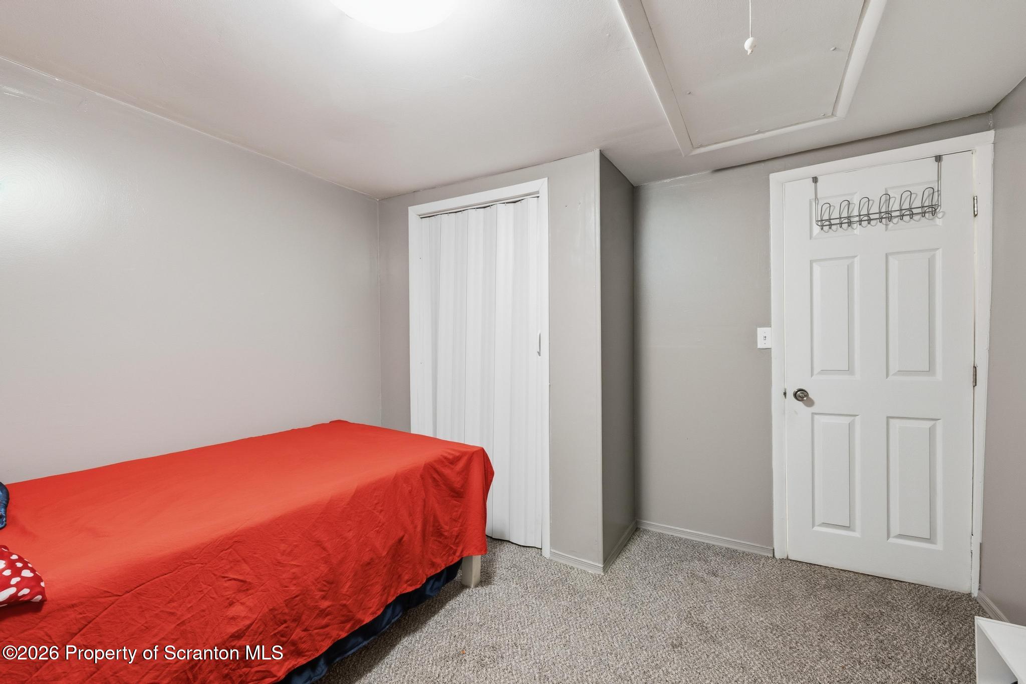 138 Swetland Street Duryea, PA 18642 - Photo 13 of 34 a bedroom with a bed and a closet