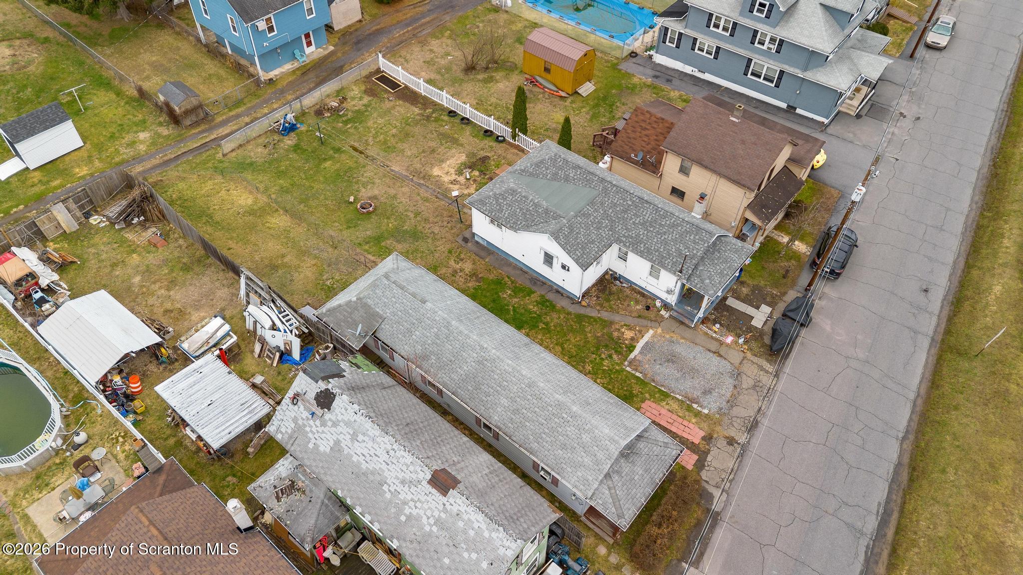 138 Swetland Street Duryea, PA 18642 - Photo 20 of 34 an aerial view of a house with a yard