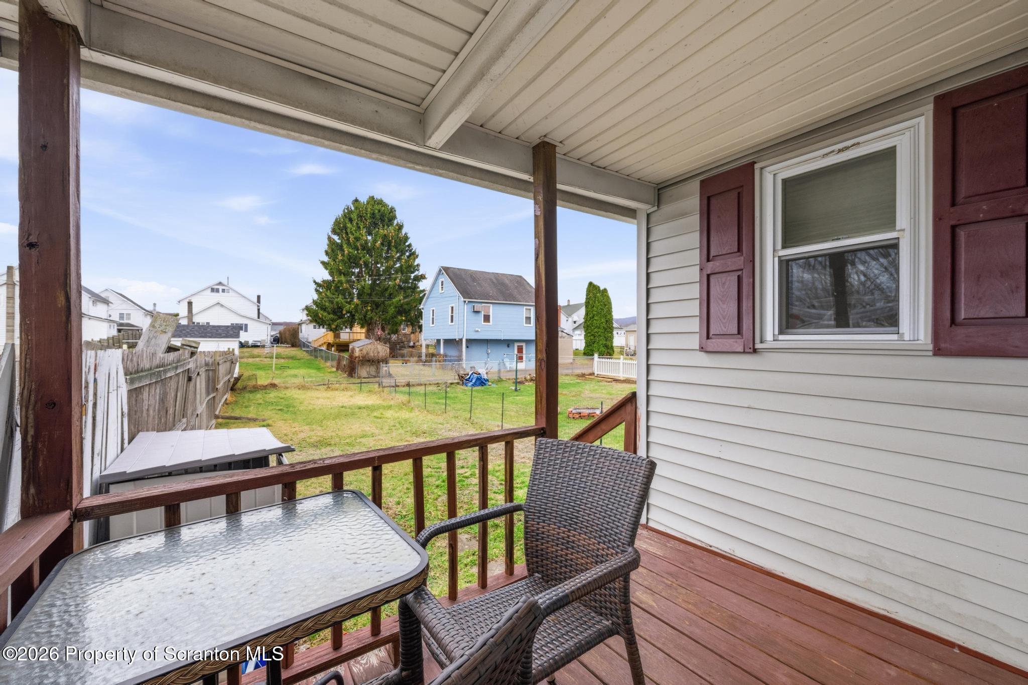 138 Swetland Street Duryea, PA 18642 - Photo 30 of 34 a view of a chairs and table in patio with a lake view