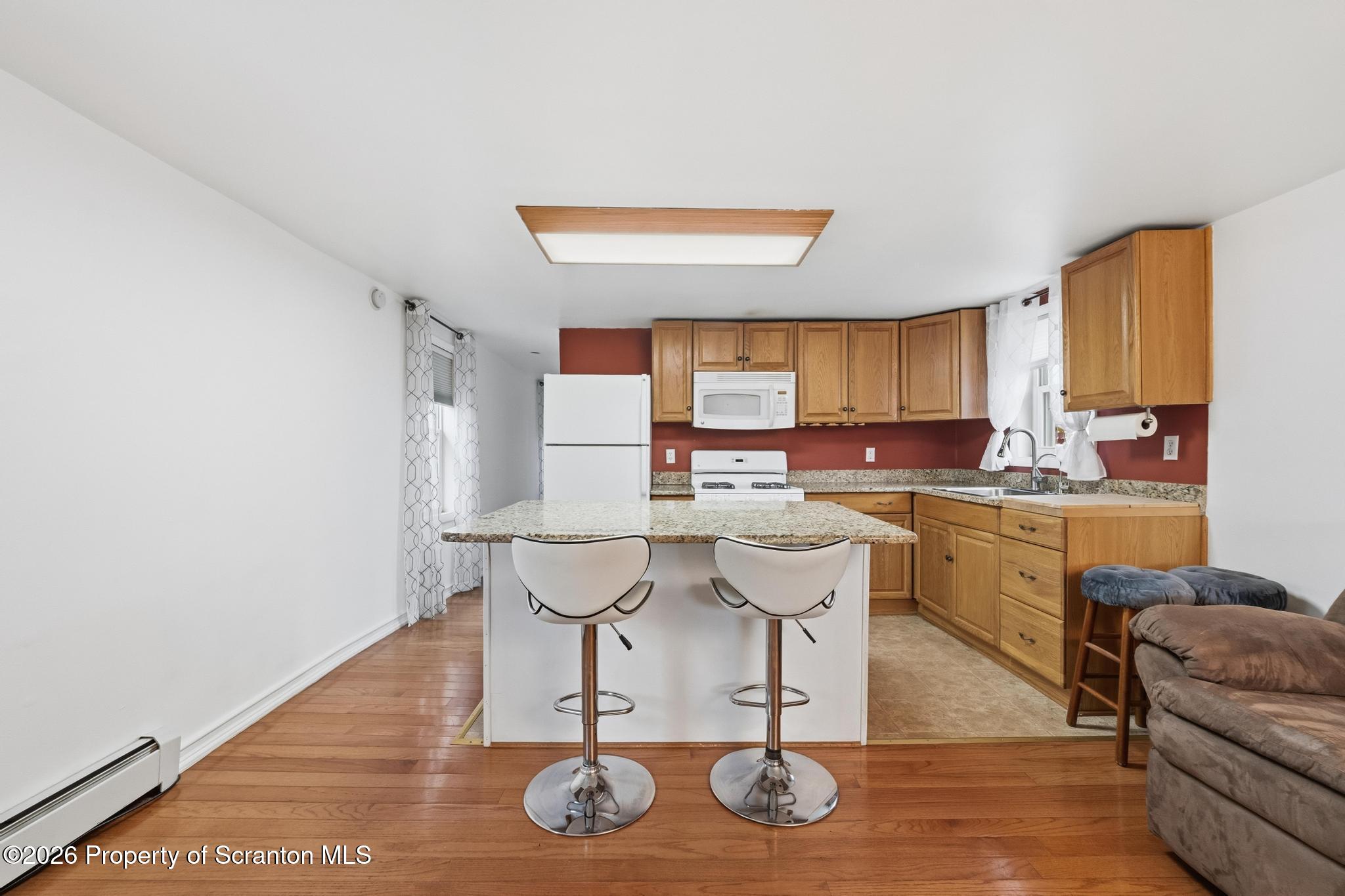 138 Swetland Street Duryea, PA 18642 - Photo 5 of 34 a kitchen with a sink cabinets and window