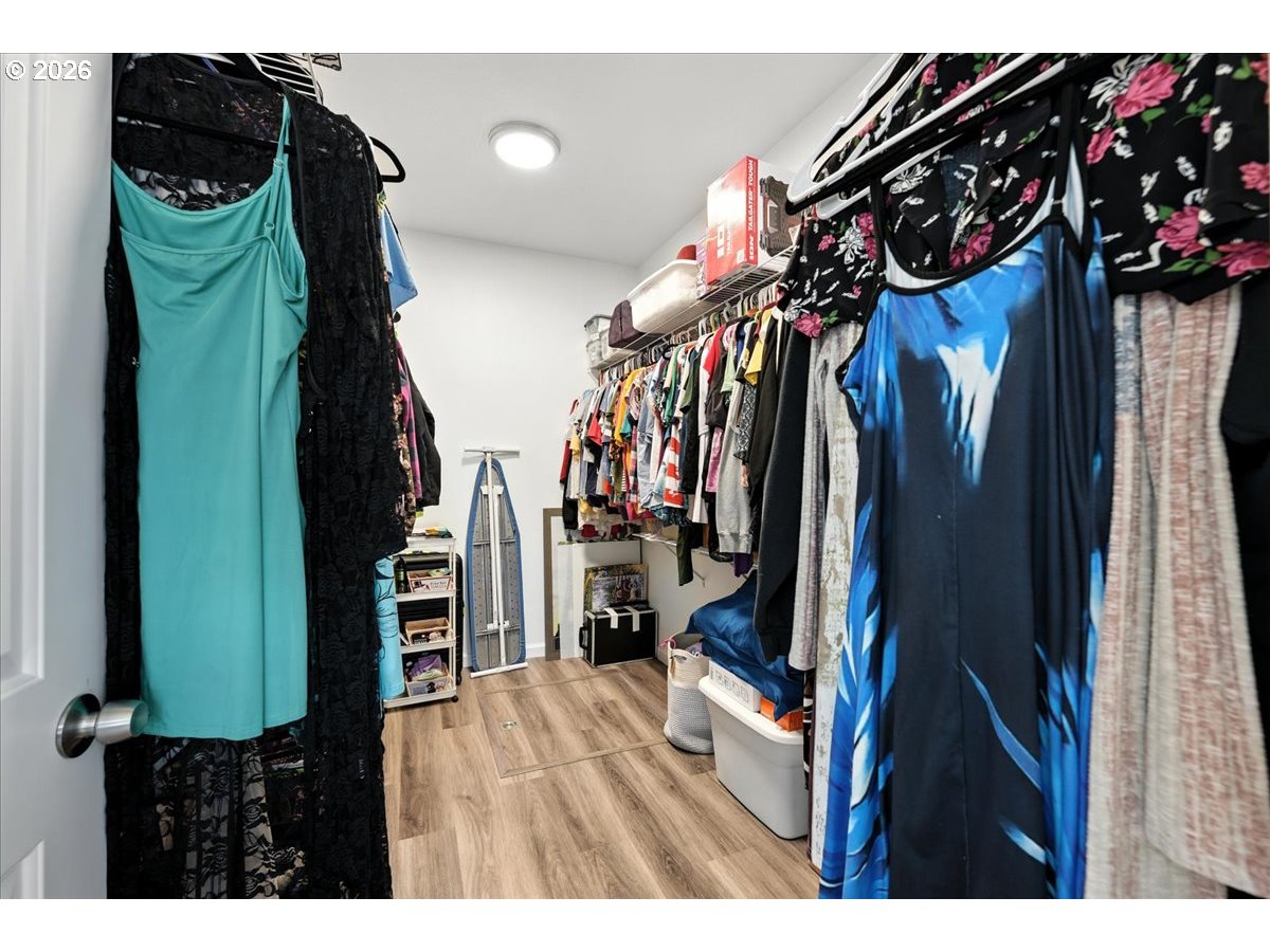 34155 Southeast Moss Hill Road Estacada, OR 97023 - Photo 11 of 26 a view of walk in closet with clothes and shoes