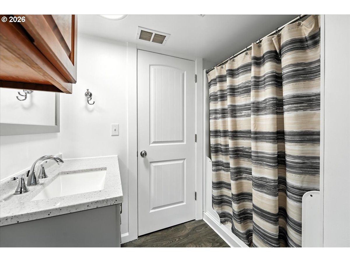 34155 Southeast Moss Hill Road Estacada, OR 97023 - Photo 17 of 26 a bathroom with a sink and a shower